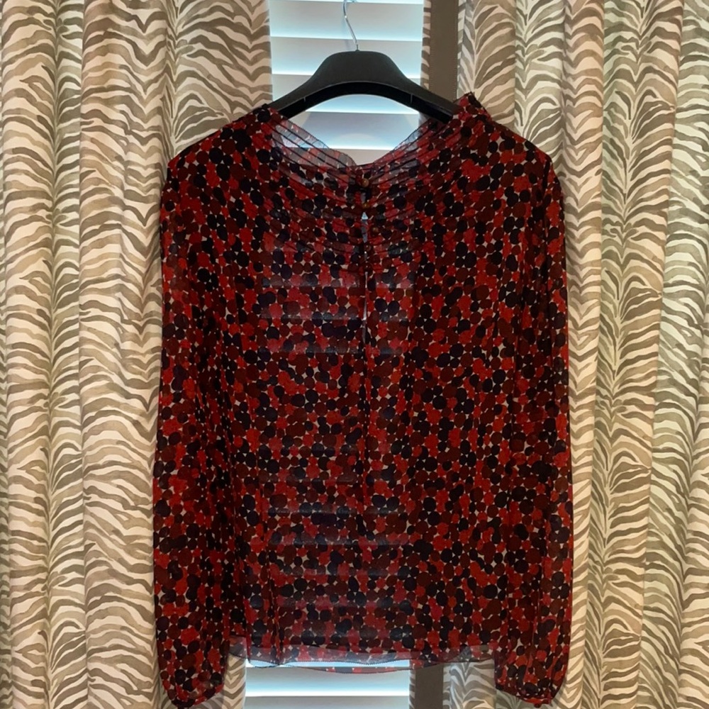 A gently worn DVF top, loose fit with bottoms